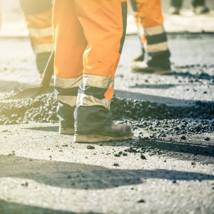 teamwork-on-road-construction-2023-11-27-04-58-42-utc